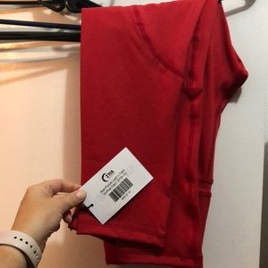 Red ZYIA pocket light n tight hi rise Capri (20”)